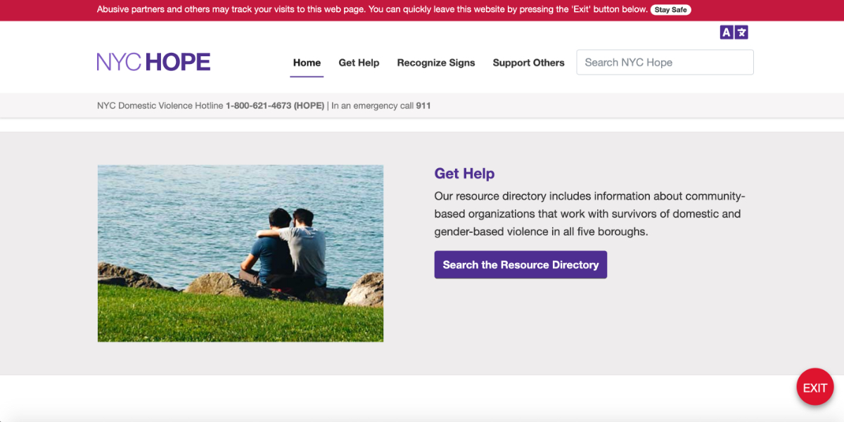 A webpage displays a picture of two men hugging